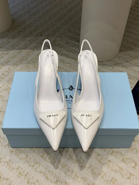 Prada Shoes - Prada White Slingback Heels
